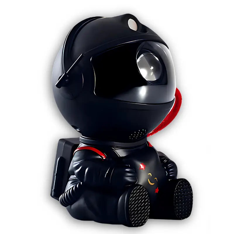 Bonita estatueta em estilo de desenho animado de um robô preto ou personagem de astronauta com olhos brilhantes e detalhes em vermelho.